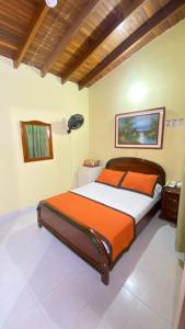Letto o letti in una camera di Hotel Tequendama