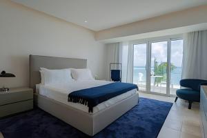 Postel nebo postele na pokoji v ubytování Punta Palmera Beach Front and pool views Cap Cana