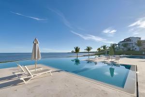 Piscina a Punta Palmera Beach Front and pool views Cap Cana o a prop
