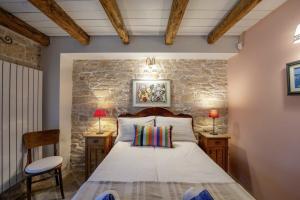 Posteľ alebo postele v izbe v ubytovaní Villa Salambati 9 in Salambati (Haus für 8-9 Personen)