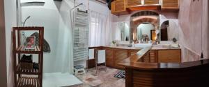 a bathroom with a sink and a mirror at Angoletto Medioevale in Viterbo +57 photos