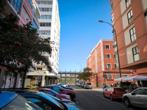 a street with cars parked on the side of the road at Turina House - 3 habitaciones in Las Palmas de Gran Canaria