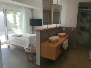 Fotografie z fotogalerie ubytování Paralia Luxury Suites v destinaci Agios Stefanos
