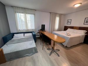 Postel nebo postele na pokoji v ubytování Hotel Times Square 913 São Paulo Moema