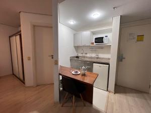 Kuchyň nebo kuchyňský kout v ubytování Hotel Times Square 913 São Paulo Moema