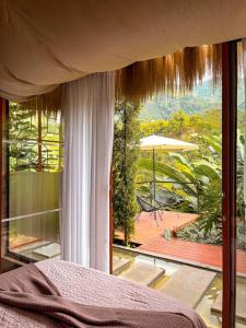 A bed or beds in a room at Intrepido Glamping