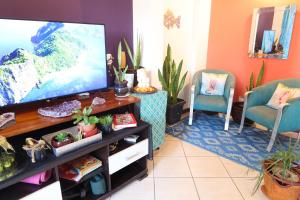TV/trung tâm giải trí tại Recreio - CorAll Experience - 2 Quartos e 1 Suíte +53 ảnh