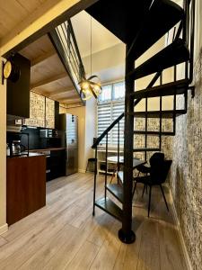 a living room with a loft bed and a kitchen at Apartament Jelonka in Jelenia Góra +53 photos