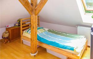 Ένα ή περισσότερα κρεβάτια σε δωμάτιο στο Stunning Apartment In Gdansk Stogi +8 φωτογραφίες