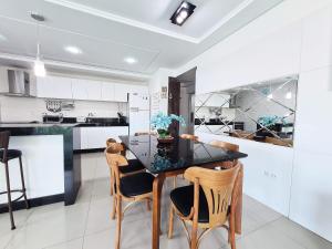 Kuchyň nebo kuchyňský kout v ubytování Residencial Dunas
