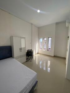 Katil atau katil-katil dalam bilik di Kamar Kost