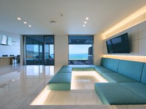 Μια τηλεόραση ή/και κέντρο ψυχαγωγίας στο private villa YUHIMI 夕日見の丘