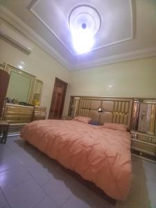 Katil atau katil-katil dalam bilik di Maison Téranga