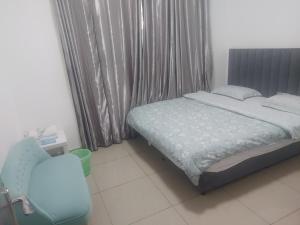Ένα ή περισσότερα κρεβάτια σε δωμάτιο στο Shaikh Vacation Homes