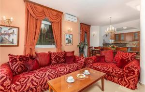 Posezení v ubytování 3 Bedroom Nice Home In Veprinac