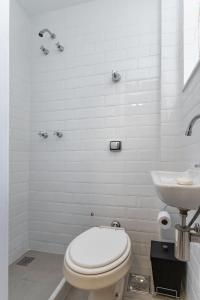 Ванная комната в Apartamento vista mar e vista pão de açúcar