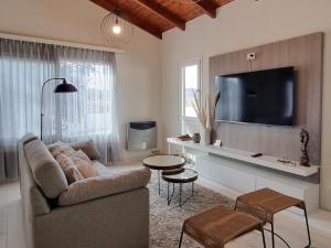 TV a/nebo společenská místnost v ubytování Chalet Alter Boss
