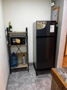 Η κουζίνα ή μικρή κουζίνα στο Cómodo apartamento en el este de Barquisimeto +5 φωτογραφίες