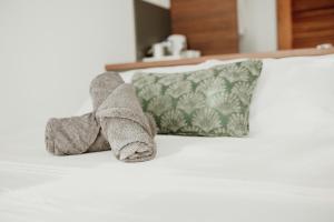 Postel nebo postele na pokoji v ubytování Mata e' Platano Guesthouse + 37 fotografií