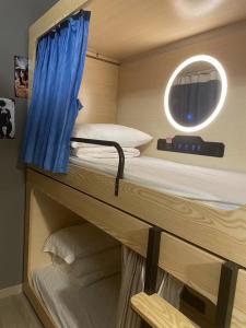 Postelja oz. postelje v sobi nastanitve Soso Hostel