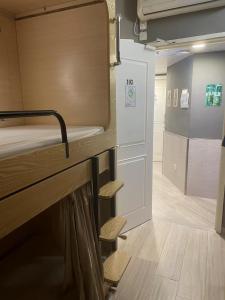 Postelja oz. postelje v sobi nastanitve Soso Hostel