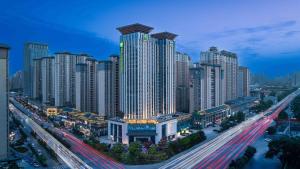 a city with many tall buildings and a freeway at Holiday Inn Express Xi'an Daxing by IHG in Xi'an