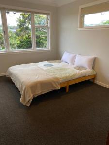 Postel nebo postele na pokoji v ubytování CBD Budget room