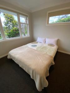 Postel nebo postele na pokoji v ubytování CBD Budget room + 2 fotografie