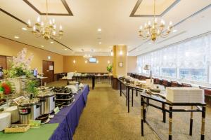 a buffet line in a restaurant with tables filled with food at Hotel Monte Hermana Sendai in Sendai +54 photos