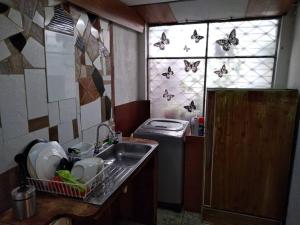 Kuchyň nebo kuchyňský kout v ubytování Casa Viva apartaestudio terraza II