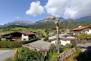 a view of a village with mountains in the background at Haus Jasmin in Ellmau