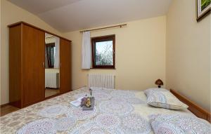 Posteľ alebo postele v izbe v ubytovaní Holiday Home Orihi I