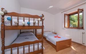 Posteľ alebo postele v izbe v ubytovaní Holiday Home Orihi I