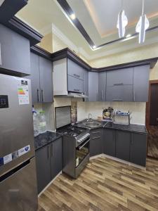 Dapur atau dapur kecil di Samarkand Boulevard Apartment