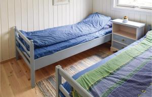 Postel nebo postele na pokoji v ubytování Two-Bedroom Holiday Home In Rygge