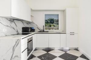 Nhà bếp/bếp nhỏ tại Nitti 76 Luxury Apartment