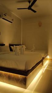 Katil atau katil-katil dalam bilik di La Shashalia Luxury