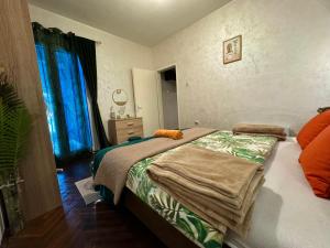 Letto o letti in una camera di ApartHotel Maxim