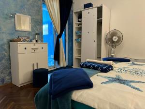 Letto o letti in una camera di ApartHotel Maxim