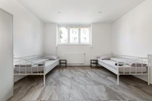 Posteľ alebo postele v izbe v ubytovaní Hostel na Šalamouně