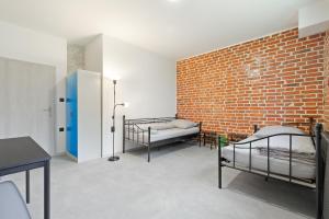 Posteľ alebo postele v izbe v ubytovaní Hostel na Šalamouně