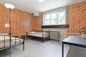 Posteľ alebo postele v izbe v ubytovaní Hostel na Šalamouně