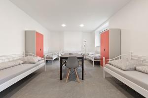 Posteľ alebo postele v izbe v ubytovaní Hostel na Šalamouně