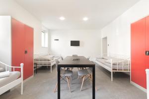 Posteľ alebo postele v izbe v ubytovaní Hostel na Šalamouně