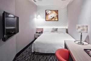 Televiisor ja/või meelelahutuskeskus majutusasutuses V-one Hotel - Ningxia No. 2 Inn +27 fotot