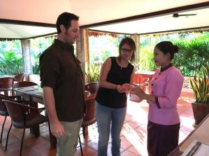 a man and a woman standing next to each other at Apsara Greenland Boutique Villa & Resort in Siem Reap
