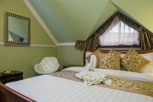 Posteľ alebo postele v izbe v ubytovaní Winter & Summer Resort
