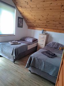 Posteľ alebo postele v izbe v ubytovaní Sunny Lake House Warmia i Mazury jezioro Dadaj