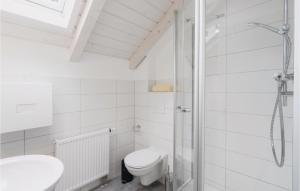 Ein Badezimmer in der Unterkunft Ferienhausdorf Thale