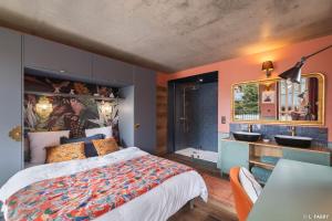 Ένα ή περισσότερα κρεβάτια σε δωμάτιο στο Odalys Chalet le Duc Blanc